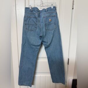 Carhartt Men’s Relaxed Fit Light Wash Blue Jeans
Size 33X32 Thrashed work jeans